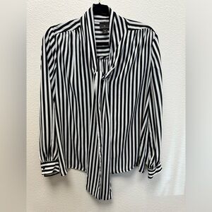 Very classy blouse. Soft and light weight.